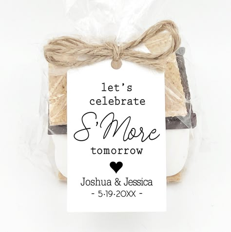 "Rehearsal Dinner Favor, Let's Celebrate S'More Tomorrow, Smore's Rehearsal Dinner Favors ------------------------ DIY Kit - KITS Include: - Tags ( 1 3/4\" x 2 3/4\" ) - Clear Bags- 4 x 2 x 8 - Tie - 1 yard per 4 tags (ties will need to be cut to 9\" by buyer) NO FAVORS ARE INCLUDED PLEASE NOTE: Tags are formatted for print & cannot be changed except the personalized lines. Also it is not possible to add lines. PRODUCTION IS 7 DAYS AND NORMAL SHIPPING IS 3-5 DAYS. Upgrading to priority at checko Rehearsal Dinner Soup Bar, Rehearsal Dinner Goodie Bags, Christmas Themed Rehearsal Dinner, Campfire Rehearsal Dinner, Wedding Rehearsal Favors, Rehersal Dinner Ideas Table, Rehearsal Dinner Gifts For Guests, Decorations For Rehearsal Dinner, Rehearsal Dinner Desserts