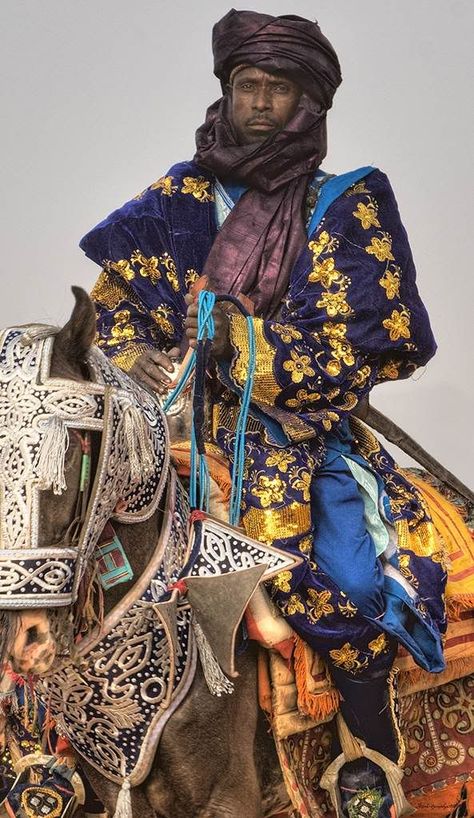 "Mahayin Doiki (Horse Rider)".  Hausa  at the Durban in Argungu, 2009, Kebbi State, Nigeria | ©Irene Becker. Afrikaanse Kunst, African People, We Are The World, African History, People Of The World, African Culture, World Cultures, African Beauty, 인물 사진