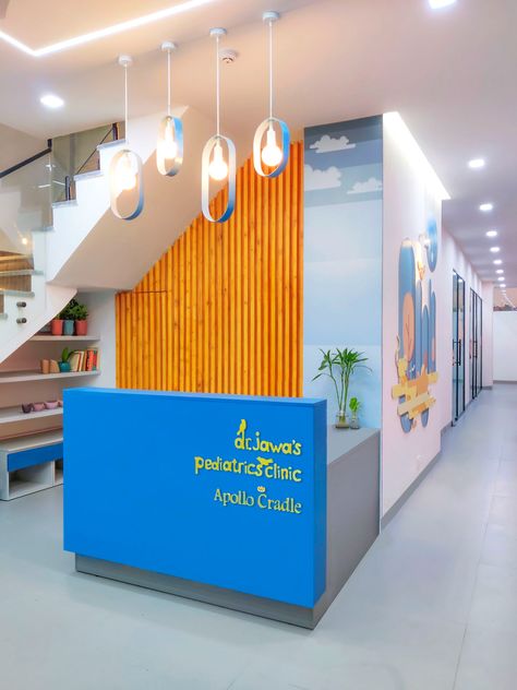 Apollo Cradle Pediatrics Clinic - Healthcare Snapshots Reception Under Stairs, Daycare Interior Design, Pediatric Office Decor, Healthcare Snapshots, Children Hospital Design, Children's Clinic, Indoor Playroom, Kindergarten Interior, Preschool Designs