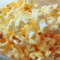 White Chocolate Popcorn - Allrecipes.com Almond Bark Popcorn, Chewy Oatmeal Bars, White Chocolate Popcorn Recipe, Popcorn Recipes Chocolate, Chocolate Covered Potato Chips, White Chocolate Popcorn, Candied Almonds, Popcorn Recipe, Chocolate Popcorn