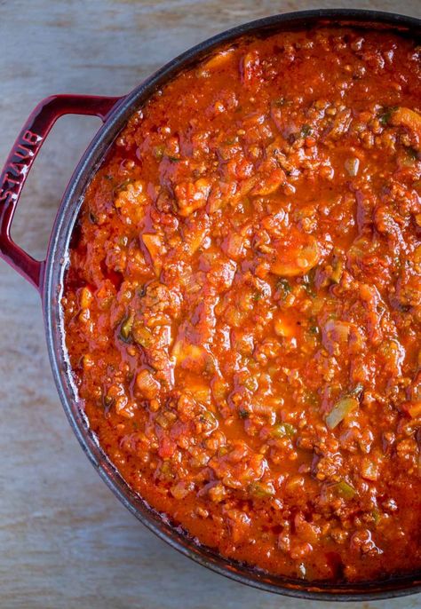 Delicious SPAGHETTI SAUCE FROM SCRATCH. Once you taste this fabulous recipe for spaghetti meat sauce, you'll agree - it's the only homemade spaghetti sauce recipe you'll ever need! Perfect for serving with your favorite pasta. This meat sauce is also wonderful for making lasagna. #homemadepastasauce #spaghettisaucefromscratch #homemadespaghettisauce # bestspaghettisauce #spaghetti #spaghettisauce #meatsauce #Italianrecipes #italianfood #spaghettimeatsauce #easyhomemadespaghettisauce Pasta Sauce From Scratch, Meaty Spaghetti Sauce, Spaghetti Sauce From Scratch, Homemade Spaghetti Sauce Easy, Best Spaghetti Sauce, Homemade Spaghetti Sauce Recipe, Delicious Spaghetti, Sauce Spaghetti, Spaghetti Meat Sauce