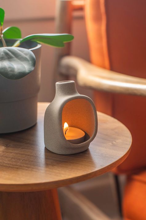 Flue is a handmade candle & incense holder by Studio Weesh. It is perfectly sized to accommodate tea candles & cone incense. Flue is designed to bring the warmth of tiny fireplace to your tabletop. All pieces are 100% handmade in our studio using slip cast ceramics. One tea candle is included with each holder. To learn more about the design, visit our website @ studioweesh.com Ceramic Tea Candle Holders, Tea Lights Ideas, Cute Incense Holder, Clay Cone Incense Holder, Small Ceramic Candle Holders, Candle Shrine, Pottery Incense Burner, Pottery Incense Holder Handmade Ceramic, Terracotta Incense Holder