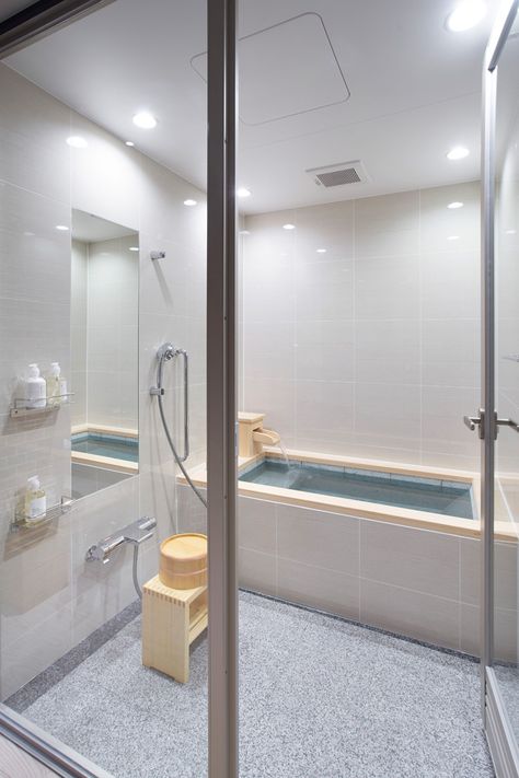 In this bathroom, the designers have taken inspiration from the nearby hot springs, and included a Furo (or Ofuro), a deep Japanese soaking tub. Fun Bathrooms, Japan Bathroom, Washroom Designs, Japanese Bathrooms, Japanese Bathroom Design, Japanese Shower, Japanese Style Bathroom, Japanese Bathroom, California Street