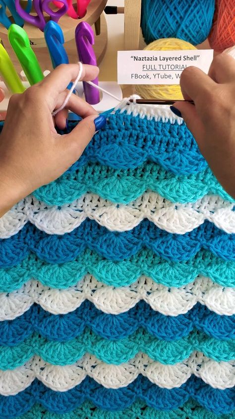 You can crochet this layered shell stitch to look like ocean waves 🌊🧶 using shades of blue, green, and white yarn. The pattern consists of single, double and treble crochet stitches. #reels #crochet #knitting #embroidery #crafts #waves #yarn #wool #makersgonnamake #tutorial #howto #naztazia | Naztazia | Crochet Waves, Waves Crochet, Shades Of Blue Green, Treble Crochet, Knitting Embroidery, Temperature Blanket, Embroidery Crafts, Treble Crochet Stitch, Shell Stitch