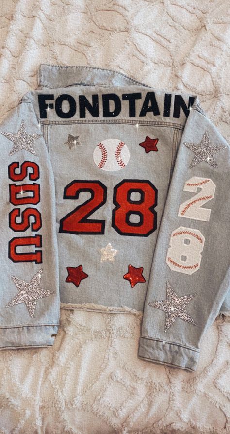 Custom Sports Jean Jackets, Baseball Custom Shirts, Gf Baseball Shirts, Baseball Game Outfit High School, Football Girlfriend Denim Jacket, Boyfriend Football Jean Jacket, Sports Team Jean Jacket Diy, High School Baseball Game Outfit, Football Girlfriend Jean Jacket Ideas