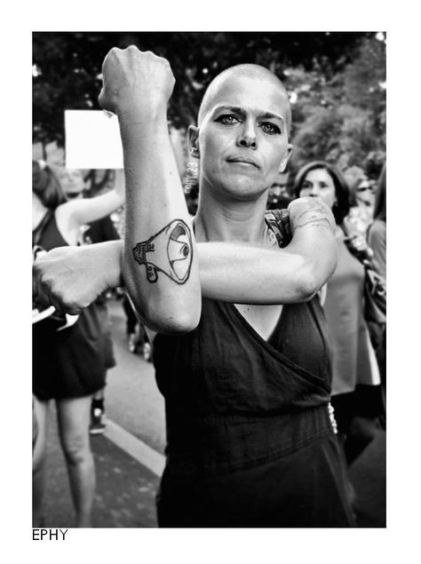 Powerful.  Portugal austerity strike. Wish I knew who the photographer was. Megaphone Tattoo, Feminist Infographic, Solidarity Tattoo, Protest Tattoo, Feminist Killjoy, Riot Grrl, Celebrate Women, City People, Iconic Images