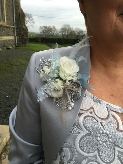 Silver jacket corsage by The Posy Barn Gray Corsage, Silver Corsage And Boutonniere, White And Silver Corsage, Silver Wedding Lapel Pin, Silver Flower Pins For Wedding, Brooch Boutonniere, Upcycled Accessories, Corsage And Boutonniere Set, Prom Corsage And Boutonniere