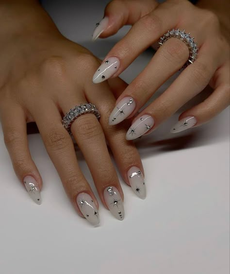 Star Nail Designs Simple, Nail Art Designs New Years, Short Almond Nails With Rhinestones, Studded Nail Art, Silver Celestial Nails, 2024 Almond Nails, Almond Bday Nails, Nails With Small Gems, Divine Feminine Nails