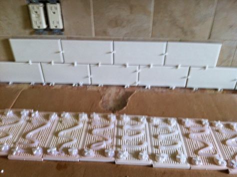 tiling over tile Tile Over Tile, Cleaning Bathroom Tiles, Old Tiles, Tile Backsplash Bathroom, Diy Kitchen Backsplash, Kitchen Design Diy, Kitchen Tiles Design, Diy Tile, Subway Tile Backsplash