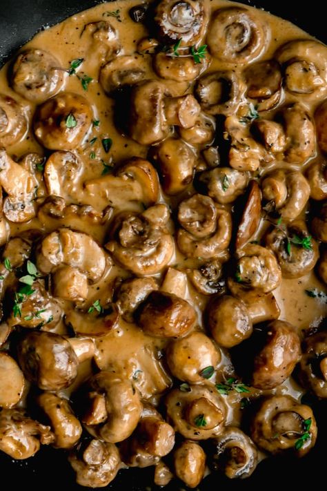 Cremini and button mushrooms sauteed in butter and garlic. Then quickly simmered in a creamy parmesan sauce until tender. The perfect topping to pork or steak off the barbecue or just eat'em all by themselves! #creamygarlicmushrooms #garlicmushrooms #sauteedgarlicmushrooms #garlicmushroomsrecipes #mushroomrecipes #garlicmushroomsauce # Sauteed Button Mushrooms, Mushroom Topper For Steak, Steak Toppers, Cremini Mushroom Recipes, Thanksgiving Mushrooms, Mushroom Side Dish Recipes, Keto Prep, Mushrooms Sauteed, Steak Toppings