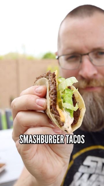 Brad Prose | Chiles and Smoke on Instagram: "Smashburger Tacos are hitting the streets. Grab some tortillas and let’s GO! I’ve been working on this process for a bit and realized that smashing the meat with the flour tortilla directly on the griddle is very effective, and saves a few steps of preparation. The full walkthrough is in my bio @chilesandsmoke. These cook quickly, and with a tortilla instead of the buns you can crush more meat + toppings. Cooked on the @webergrills propane griddle Smashburger Tacos, Tortilla Grill, Propane Griddle, Hamburger Sliders, Taco Burger, How To Make Hamburgers, Recipes With Flour Tortillas, Hamburgers Grilled, Tortilla Press