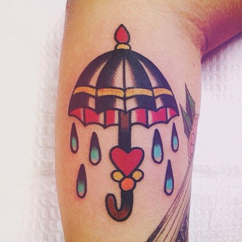 Traditional umbrella tattoo | by Kris Maron | at Up In Arms Tattoo (Moon Twp, PA) Traditional Umbrella Tattoo, Old Style Tattoos, Traditional Umbrella, Tato Tradisional, Rain Tattoo, Umbrella Tattoo, Skin Color Tattoos, Traditional Style Tattoo, Inspiration Tattoos