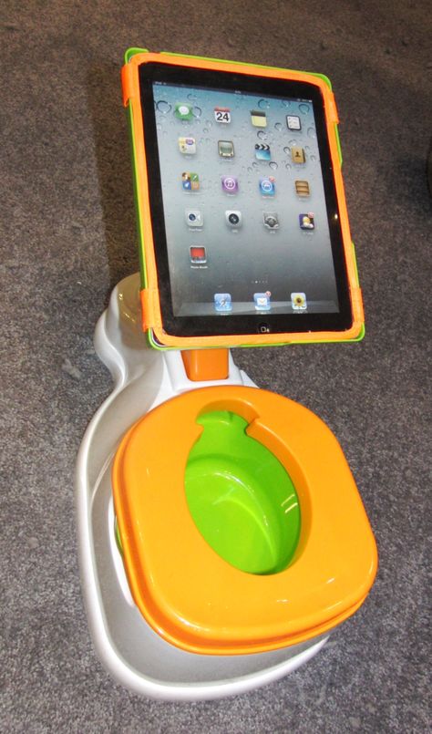 Would you do this to your iPad? The 2-In-1 iPotty with Activity Seat for iPad from CTA Digital of Brooklyn, New York is a simple potty training setup which uses an iPad to keep a child focused and in one spot while he, er, learns to do his business the right way. The tablet holder has a clear protective cover and can pivot from landscape to portrait position. The $40 iPotty turned heads at Toy Fair 2013 in New York. (Photo Copyright 2013, Robert S. Anthony, Stadium Circle Features.) Potty Training Humor, Kids Ipad, Easy Potty Training, Ipad Kid, Youth Games, Diy Camera, Potty Training Tips, Ipad Kids, Kids Focus