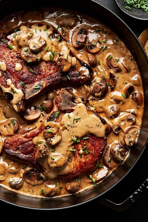 Pork Chops with Mushroom Cream Sauce | The Modern Proper Pork Chop Mushroom Sauce, Pork Chops With Mushroom Sauce, Pork Chop Recipes With Mushrooms, Pork Chop Mushroom Recipes, Pork Chops Mushrooms, Creamy Mushroom Pork Chops, Pork Chops With Mushrooms, Gluten Recipes, Pork Dinners