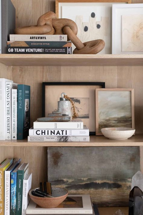 West Coast style meets modern farmhouse in this unforgettable LA home Portola Paint, Mission Tile, Styling Shelves, Wood Garage Doors, Bookcase Styling, West Coast Fashion, Cabinet Paint Colors, Amber Lewis, Bookshelf Styling