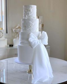 Amazing Wedding Cake Designers We Totally Love ★ wedding cake designers tall white with bow iconic.cake Bow Wedding Cakes, Butterfly Wedding Cake, Wedding Cake Options, Fancy Wedding Cakes, Perfect Wedding Cake, Creative Wedding Cakes, Bow Cakes, Wedding Cake Roses, Wedding Cake Ideas