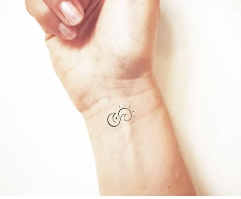 Symbol Of Calmness Tattoo, Son And Moon Tattoo Small, What Does A Wave Tattoo Symbolize, Tattoo For Calmness, Flow Symbol Tattoo, Symbol For Peace Tattoo, Calm To My Storm Tattoo, Moon Sun And Wave Tattoo, Calm After The Storm Tattoo