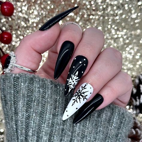 Dawn Witch Designs Unique, re-usable, hand painted, and made in Canada. These luxury press on nails are handmade using high quality gel polish and salon-grade materials.  ✨ MONOCHROME SNOWFLAKES ✨  Delicate snowflakes hand-drawn on a monochrome background. Perfect when you want a little festive in your life without all the garish colours.  *The shape shown in the pictures is the LONG STILETTO *Colours may appear a little different due to your personal monitor settings* ✨ BUY 3 GET 1 PROMOTION ✨ Manicure Christmas Nails, Christmas Nails Winter, Nails Luxury, Christmas Manicure, Long Stiletto, Nails Winter, Nails Christmas, Snowflake Nails, Christmas Nail Designs