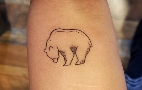 10+ Minimalist Bear Tattoo Ideas That Will Inspire You To Get Inked Grizzly Bear Tattoos Simple, Minimalist Bear Tattoo Simple, Ursa Major Tattoo Minimalist, Funny Bear Tattoo, Brown Bear Tattoo For Women, Bear Finger Tattoo, Black Bear Tattoo Women, Mountain Bear Tattoo, Cute Bear Tattoo For Women