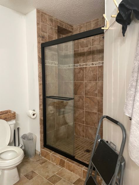 Door To Backyard From Bedroom, Tile Shower Remodel Diy, Can You Paint Shower Tile Walls, Brown Tile Bathroom Makeover, Bathroom Remodel With Brown Tile, Paint Tile Shower Wall, How To Paint Shower Tiles In Bathroom, Painting Tile Shower Wall Before And After, Shower Tile Update Diy