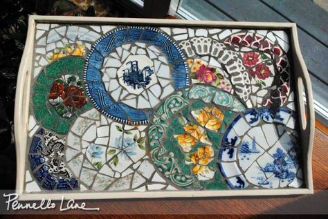 Making mosaics out of china has to be one of the most enjoyable crafts I’ve tried.  Here’s a tea tray I made using china plates and saucers.  It started when I broke one of my mother&#8… Broken China Crafts, Mosaic Tray, China Crafts, Mosaic Madness, Mosaic Stained, Mosaic Art Projects, Broken China Jewelry, Mosaic Table, Broken China