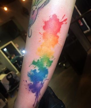 Rainbow Watercolors Rainbow Watercolor Tattoo Backgrounds, Splatter Tattoo, Wolf Tattoo Forearm, Lgbt Tattoo, Inspiring Tattoos, Watercolour Tattoos, Pride Tattoo, Simple Tattoos For Guys, Rainbow Tattoos