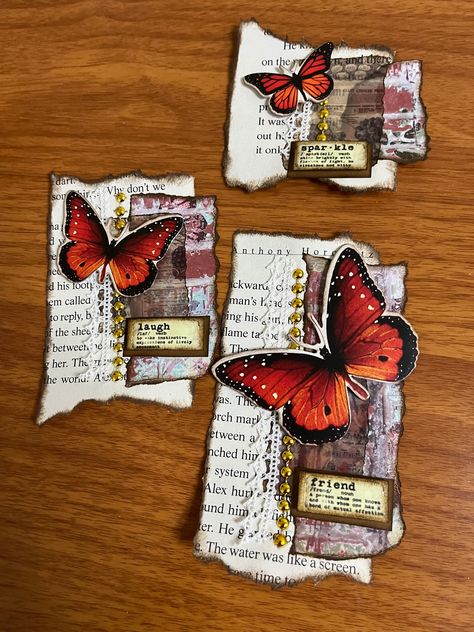 Set of 3 Cluster embellishments. Three different sizes: 4x2.5in 3.5x2.5in 2.5x2.5in Made with book pages, scrapbook paper, and other embellishments. Four different colors or themes Rose Yellow butterflies Lily Orange butterflies Free shipping only in the USA when you spend $30 or more! Paper Clusters For Journals, Junk Journal Themes Ideas, Junk Journal Embellishments Ephemera, Cluster Embellishments, Butterfly Tags, Journal Clusters, Orange Butterflies, Handmade Journals Diy, Embellishment Ideas