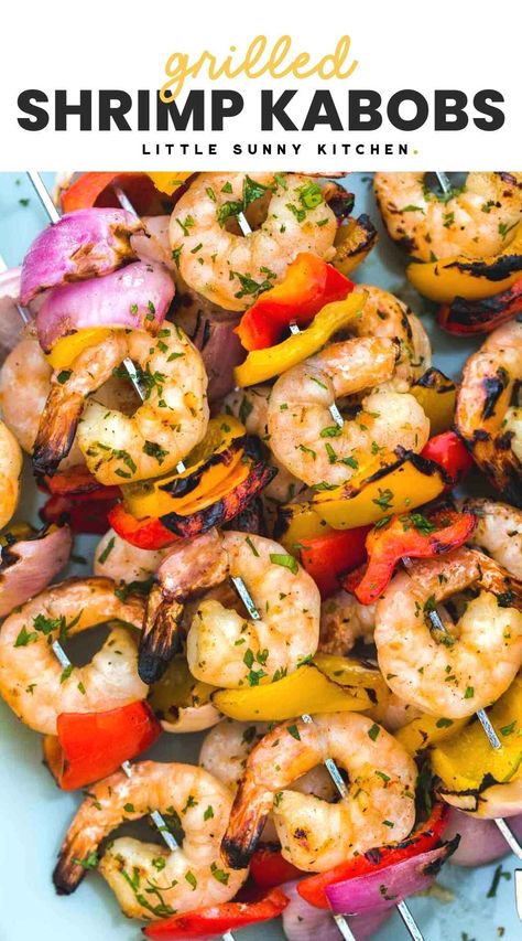 Grilled Shrimp Kabobs are the summer dinner that’s ready in minutes! Marinate the shrimp in lemon, garlic, and herbs with bell peppers and onions. Grilled Shrimp Kabobs, Marinated Grilled Shrimp, Shrimp Kabob Recipes, Little Sunny Kitchen, Shrimp Kabobs, Vegetable Kabobs, Grilling Kabobs, Vegetable Skewers, Sunny Kitchen