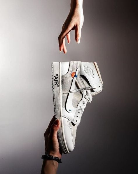 The Air Jordan 1 Retro High Off White White is made from a mix of rubber, leather, cotton and synthetic materials. Link in Bio🌐 . . . #sneakerdailyus #sneakers #hypebeast #hypebeastkicks #kicksaddict #kickstagram #nicekicks #streetwear #kicksonfire #igsneakercommunity #sneakerhead #airjordan #aj1 #aj1offwhite #aj1offwhiteeuro #aj1highoffwhite Sneakers Photography Ideas, Nike Shoot, Sneaker Photography, Red Outfits For Women, Air Jordan Mid, Jordan 1 Outfit Women, Shoe Advertising, Jordan Mid, Urban Fashion Photography