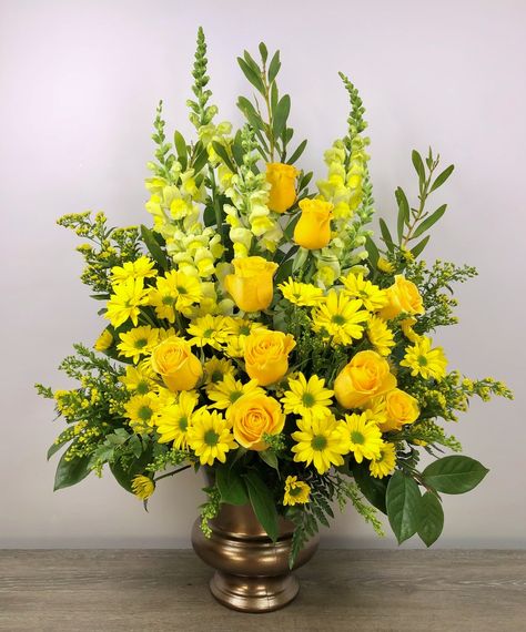 Honor a bright spirit who was like a ray of sunshine to everyone they encountered, with a grand display of bold yellow blossoms. At more than three feet tall, it will add a touch of brightness to any tribute.   SKUs: ,T219-1A Yellow Floral Arrangements, Diy Silk Flower Arrangements, Yellow Flower Arrangements, Chrysanthemum Bouquet, Arreglos Ikebana, Sympathy Arrangements, Sunflower Arrangements, Large Floral Arrangements, Unique Floral Arrangements