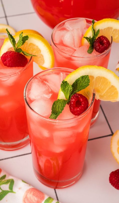 Quench your thirst and impress your guests with this easy-to-follow Peach Raspberry Lemonade recipe. A blend of juicy peaches, tart raspberries, and zesty lemon creates a drink that's not just refreshing but a feast for the eyes too.