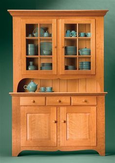 Classic Country Hutch American style and classic hardwood create a timeless treasure By Tim Johnson Tall and stately, this cupboard promises to be the focal point of any dining area. A functional wonder, it combines elegant display with spacious storage. For you as a builder, though, this cupboard is loaded with something quite different: advanced techniques that will challenge your woodworking skill. It has all the stuff to be your … Country Hutch, Woodworking Desk, Woodworking Cabinets, Woodworking Bed, Woodworking Basics, Woodworking Logo, Woodworking Toys, Woodworking Supplies, Popular Woodworking