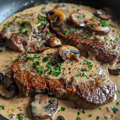 🥩 Experience the ultimate indulgence with our Pan-Seared Garlic Butter Steak with Mushroom Cream Sauce! 🥩✨ #SteakLovers #GourmetMeals Pan-Seared Garlic Butter Steak with Mushroom Cream Sauce Ingredients: Ribeye steaks (2) Butter (1/4 cup) Garlic cloves, minced (4) Mushrooms, sliced (2 cups) Heavy cream (1 cup) Olive oil (2 tbsp) Salt (1 tsp) Black pepper (1/2 tsp) Fresh parsley, chopped (for garnish) Instructions: Heat olive oil in a skillet over medium-high heat. Season steaks with salt ... Steak With Mushroom Sauce, Steak And Vegetables, Steak With Mushrooms, Mushroom Steak, Mushroom Dishes, Mushroom Cream Sauce, Butter Steak, Easy Steak Recipes, Steak And Mushrooms