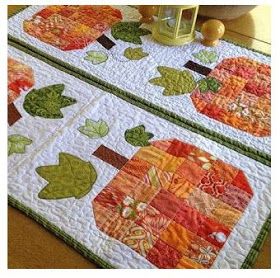 Scrappy Pumpkin runner by Angela Tackett Pumpkin Quilt Pattern, Pumpkin Quilt, Halloween Quilt Patterns, Small Quilt Projects, Fall Quilt Patterns, Fall Placemats, Pumpkin Table Runner, Quilted Placemats, Fall Sewing