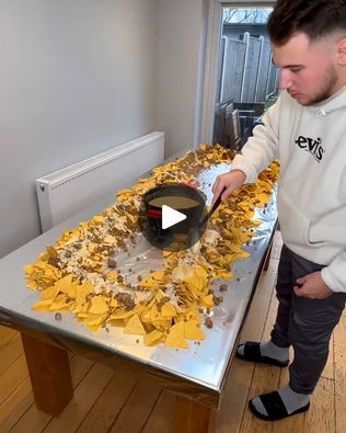 Making A Nacho Table 😯🤤 | Who needs plates 😂😋 | By FOODbibleFacebook Nacho Table Party Ideas, Nacho Bar Ideas Parties, Nachos In A Bag, Nachos Table, Nacho Table Display, Diy Taco Holder, Taco Table Party Ideas, Table Nachos, Nacho Table