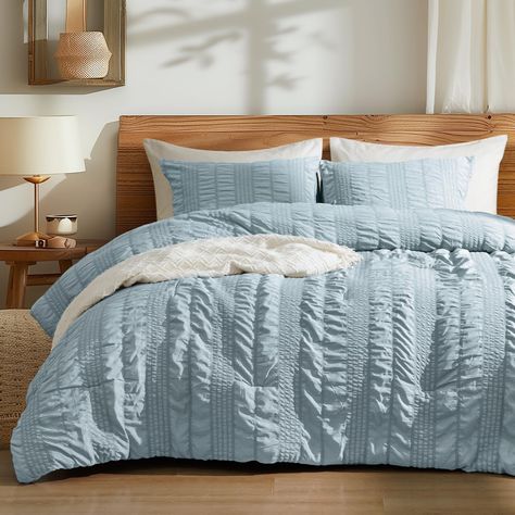 PRICES MAY VARY. Stylish Seersucker Design: PHF comforter set features a exquisite stripe seersucker design, creating a vivid three-dimensional wave pattern visual effect and making you will fall in love at first sight. The smooth brushed fabric on the back adds extra comfort. With a classic design in solid colors that blend seamlessly with any décor, this simple and fashionable set is a must-have for your bedroom. Lightweight and Softness: Indulge in luxury with PHF's premium synthetic comforte Periwinkle Bedding, Cooling Comforter, Twin Size Comforter, Queen Size Comforter Sets, King Size Comforter Sets, Boho Duvet Cover, Bed Comforter, Blue Comforter, Queen Size Comforter