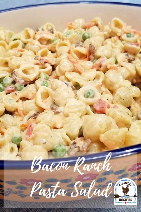 This Bacon Ranch Pasta Salad reminds me of the boxed Suddenly Salad product you can buy in the store. Only better! What’s not to love? Macaroni, Bacon, Peas, Carrots, and Ranch Dressing. My family loves this Bacon Ranch Pasta Salad. I hope you will too! #baconranchpastasalad #pastasalad #bacon #ranchdressing #salads #barbecue #familygatherings https://countryatheartrecipes.com/2018/08/bacon-ranch-pasta-salad/ Ranch Macaroni Salad Recipe, Pasta Salad Ranch, Suddenly Pasta Salad, Ranch Salad Recipes, Salad Ranch, Pasta Salad With Chicken, Chicken Bacon Ranch Pasta Salad, Bacon Peas, Spaghetti Pasta Salad