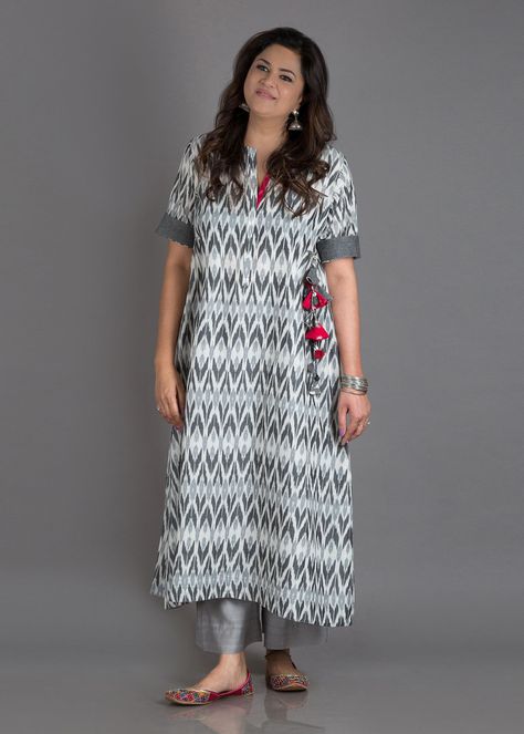 Moon Grey Mercerized Ikat Kurta with Handmade Tassels *Click on Image To Shop Latest Kurti*Best website for kurti shopping online. #Kurtishoppingonline #buykurtisonline #designerkurtionline Silk Ikat Kurta Designs, Ikat Dress Designs Latest, Ikat Dress Kurti Neck Designs, Ikat Suit Designs, Ikat Dress Kurti, Ikat Kurti Designs, Ikat Kurta Designs, Ikkat Kurta Designs, Ikat Kurti