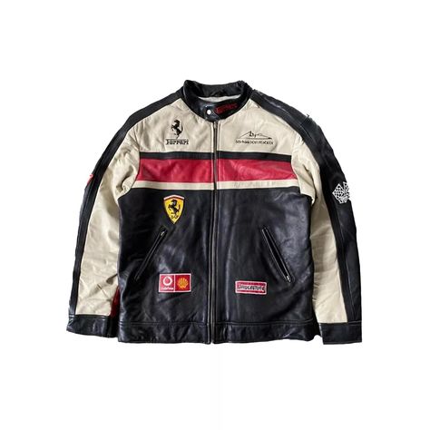 The **Ferrari Leather Racing Jacket** is a sleek, high-performance piece that combines Italian luxury with the thrill of motorsport. Crafted from premium-grade genuine leather, this jacket is designed to reflect the bold and sophisticated image of Ferrari, making it perfect for racing enthusiasts and those who appreciate fine craftsmanship. The jacket features the iconic Ferrari logo on the chest, symbolizing speed, power, and excellence. Engineered for both style and function, the Ferrari Leath Ferrari Leather Jacket, Racing Leather Jacket, Leather Racing Jacket, Ferrari Jacket, Motorbike Jackets, Ferrari Racing, Racing Jacket, Motorcycle Leather, Ferrari Logo