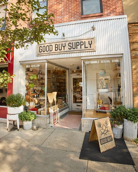 🍃 Shop small this Fall! 🌞🍂 It is a beautiful day to visit our slice of South Philly and see all we have to offer. We are filling up the shelves with practical and sustainable gifts for your upcoming Holiday shopping lists. ✨ ~ 📣 Good Buy Supply is a Sustainable General Store and Bulk Refillery located in the East Passyunk neighborhood of Philadelphia, PA. With over 500+ thoughtfully selected products for home and life they are one of the largest selections of eco-friendly goods on the East... Farm Store Building, Refillery Shop, Farmers Market Building Design, General Store Ideas, General Store Ideas Small Towns, City Grocery Store Exterior, Farm Store Ideas, Farm Store Decor, Small Town Store Fronts Main Street