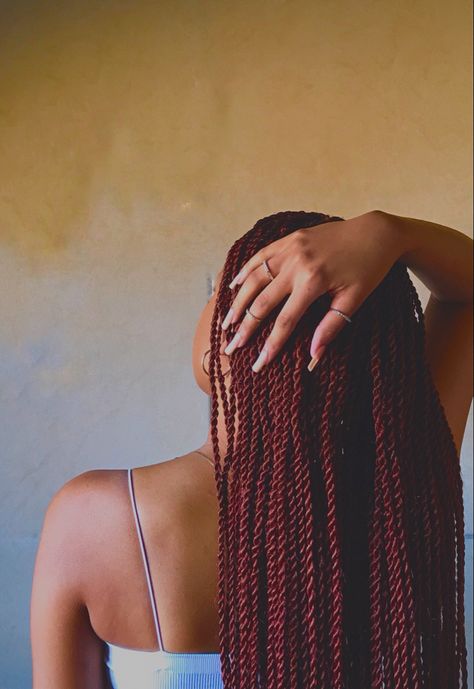 Black girl with red braided Senegalese twists Redbraids For Black Women, Red Twists Braids, Red Braids Aesthetic, Red Twists Black Women, Dark Red Braids For Black Women, Red Hair Braids Black Women, Red Twist Braids Hairstyles, Wine Red Braids, Red Braids Black Women