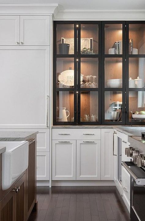 Kitchen features a custom lighted China cabinet with black glass front doors over white cabinet doors. Kitchen Cupboards Design Colour, Glass Cabinet Display, Dream Ideas, Cabin Cottage, Shaker Cabinets, Favorite Kitchen, Design Kitchen, Black Glass, China Cabinet