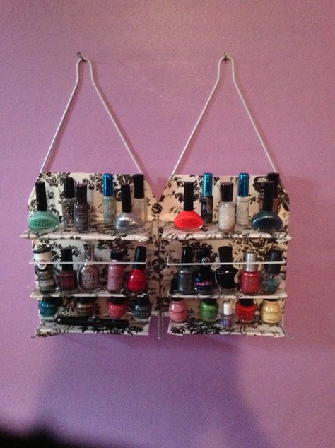 DIY dollar store nail polish rack. Just use 2 shower head racks, cover in pretty dollar store shelf paper, and hang! Super easy and cute. I made the top shelf out of cardboard. I have only 30 polishes, but it could hold 40 I'd say. Diy Dollar Store Shelf, Makeup Room Diy, Bathroom Organizing, Mermaid Beauty, Craft Paper Storage, Houses Architecture, Diy Makeup Storage, Dollar Store Diy Organization, Nail Polish Rack