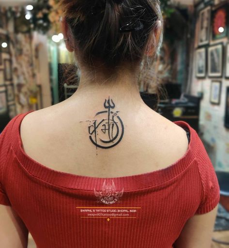 Check out this trishul tattoo with a samsara circle ⭕ and initial of karma in hindi. _____________________________________________ Artist - Swapnil Vijaywargiya STUDIO- @swapnils_tattoo_studio #bhopal #india For bookings - (8109246030) . Tattoo meaning - " - The Trishula is the three-pronged weapon and emblem of Shiva, the Hindu god of destruction. ... The three feminine (shakti) powers of will, action, and wisdom are also symbolized by the Trishula. Three more symbols of the design are desi Karma Circle Tattoo, Karma In Hindi, Shakti Tattoo, Samsara Tattoo, Trishul Tattoo, Karma Tattoo, God Of Destruction, Sanskrit Tattoo, Band Tattoos