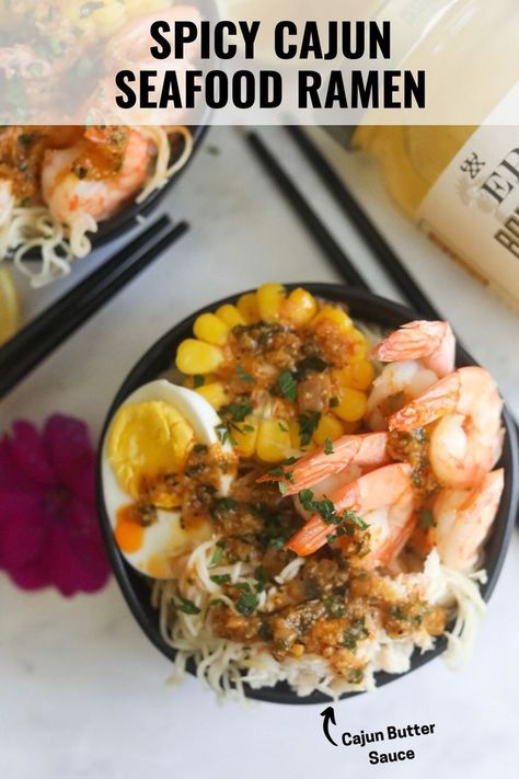 Image of seafood ramen served in a black bowl with sliced corn, egg, shrimp, crab and shrimp topped with a cajun butter sauce. Seafood Ramen, Hot Ramen, Ramen Broth, Cajun Butter, Cajun Seafood, Lump Crab, Japanese Ramen, Ramen Recipes, Homemade Butter