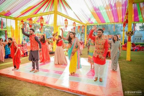 10 Ways To Make Your Sangeet Dance Practice SO Much More Fun! | WedMeGood Mehendi Decor Ideas, Indian Wedding Planner, Wedding Balloon Decorations, Dance Stage, Mehndi Decor, Indian Wedding Planning, Wedding Activities, Wedding Planning Websites, Wedding Stage Decorations