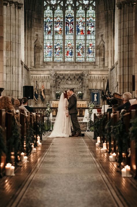 Bride and Groom Kiss At The Altar in Church Lit With Candles Winter Church Decorations, Small Wedding Ceremony Ideas Indoors, Rustic Chapel Wedding, Gothic Church Wedding, Anglican Wedding, Winter Wedding Church Decorations, Traditional Church Wedding, Christmas Church Wedding, Church Wedding Decorations Aisle Altars