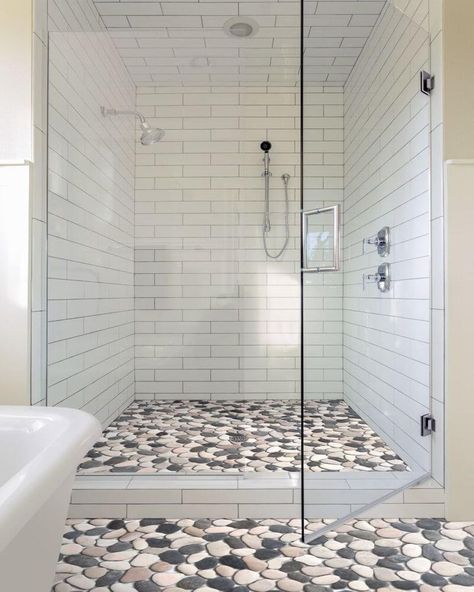 When it comes to the pebbly bathroom tile, it’s considered the best tile for shower floor exactly because of its textured anti-slip traction and naturalistic, tropical beach or “coastal” feel. Pebble Shower Floor, Scandinavian Farmhouse, Pebble Floor, Shower Floor Tile, Pebble Tile, Master Shower, Bathroom Remodels, Bathroom Shower Tile, Bathroom Remodel Shower