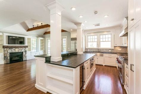 If the pass through wall is load-bearing, you could do a traditional kitchen island with support columns to ceiling Islands With Columns, Kitchen Island Ideas With Columns, Kitchen Island With Columns, Traditional Kitchen Island, Kitchen Island With Sink, Kitchen Island On Wheels, Sink In Island, Luxury Properties, Small Kitchen Island