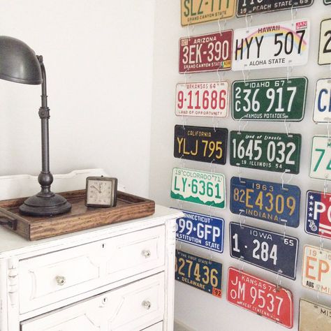 Use shower curtain rings to connect license plates together for a wall hanging. Add some color to your room by displaying vintage license plates. Wall Of License Plates, Hanging License Plates On Wall, License Plate Wall Art, License Plate Decor Wall Art, License Plates On Wall, Vintage License Plate Decor, License Plate Room Decor, License Plate Wall Decor, License Plate Decor